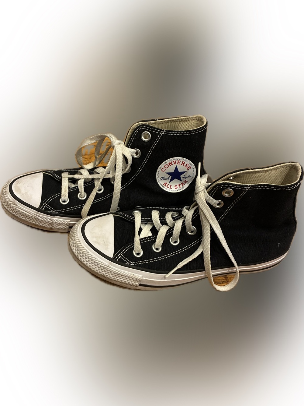 Converse Women’s High Top Sneakers in Black and White